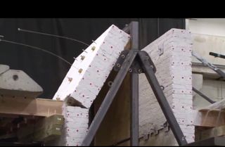 Collapsed brick wall after earthquake shake table test