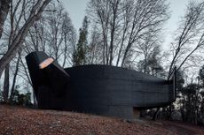 Smiljan Radic's dark coloured and organic shaped House for the Poem of the Right Angle, as we do a Chile tour through his architecture