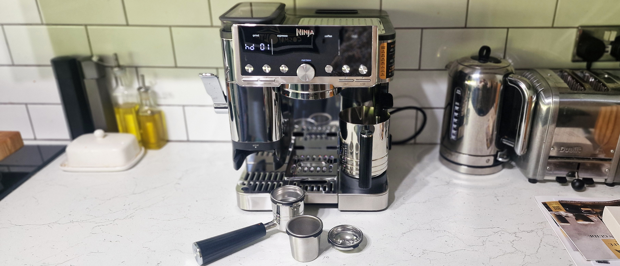 Ninja Luxe Café Pro being tested in a green and white kitchen