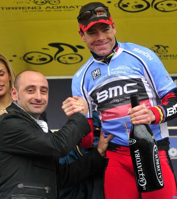 Overall leader Cadel Evans (BMC) is congratulated by Paolo Bettini