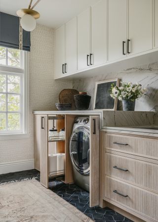 Rustic utility room with wooden cabinetry