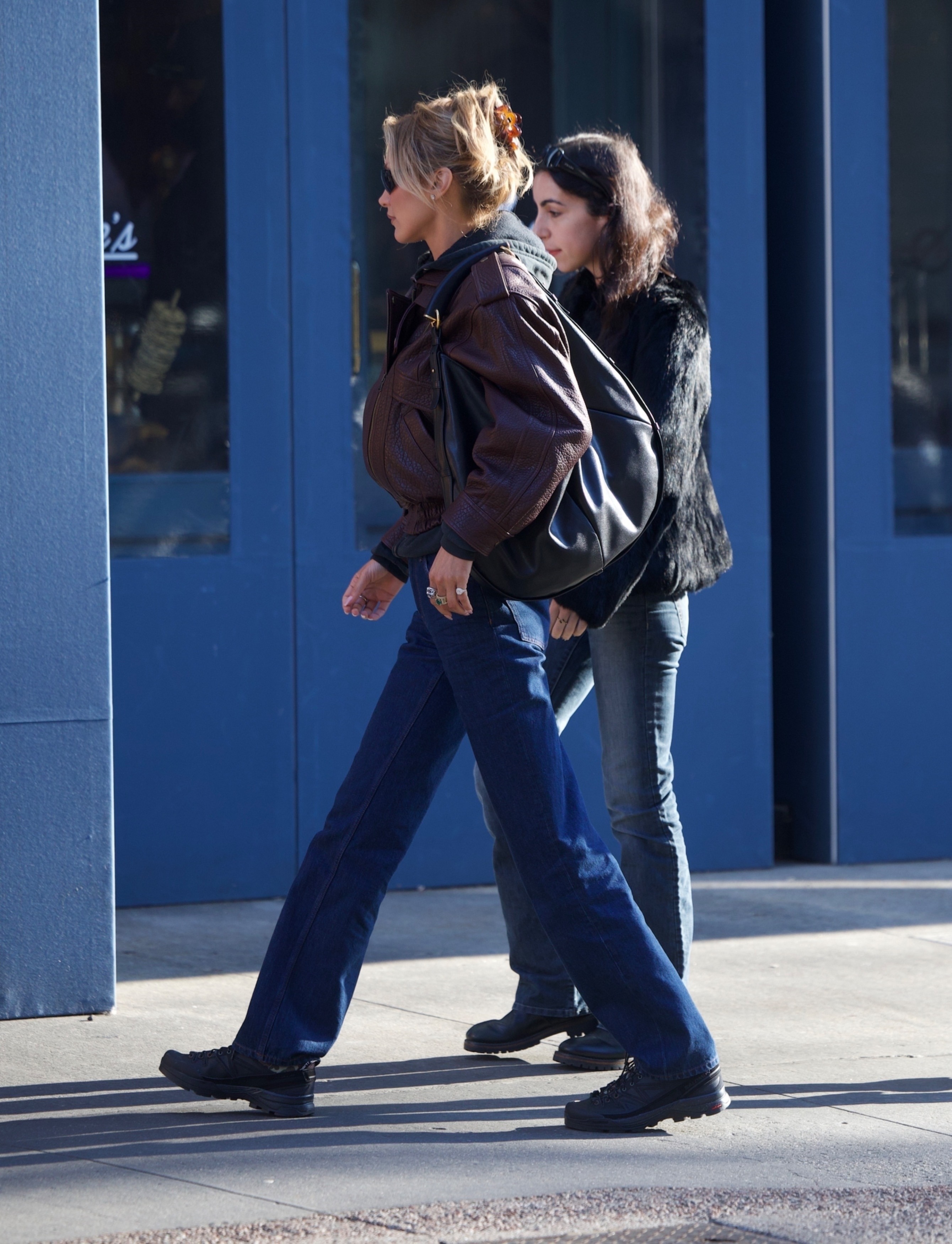 Celebrity wearing Saint Laurent bag.