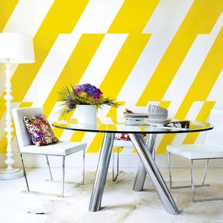 room with yellow with white striped wall