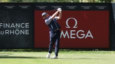 Eddie Pepperell takes a tee shot on the third day of the Omega European Masters