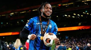 Ademola Lookman celebrates with the match ball after his hat-trick for Atalanta in the Europa League final win over Bayer Leverkusen in May 2024.