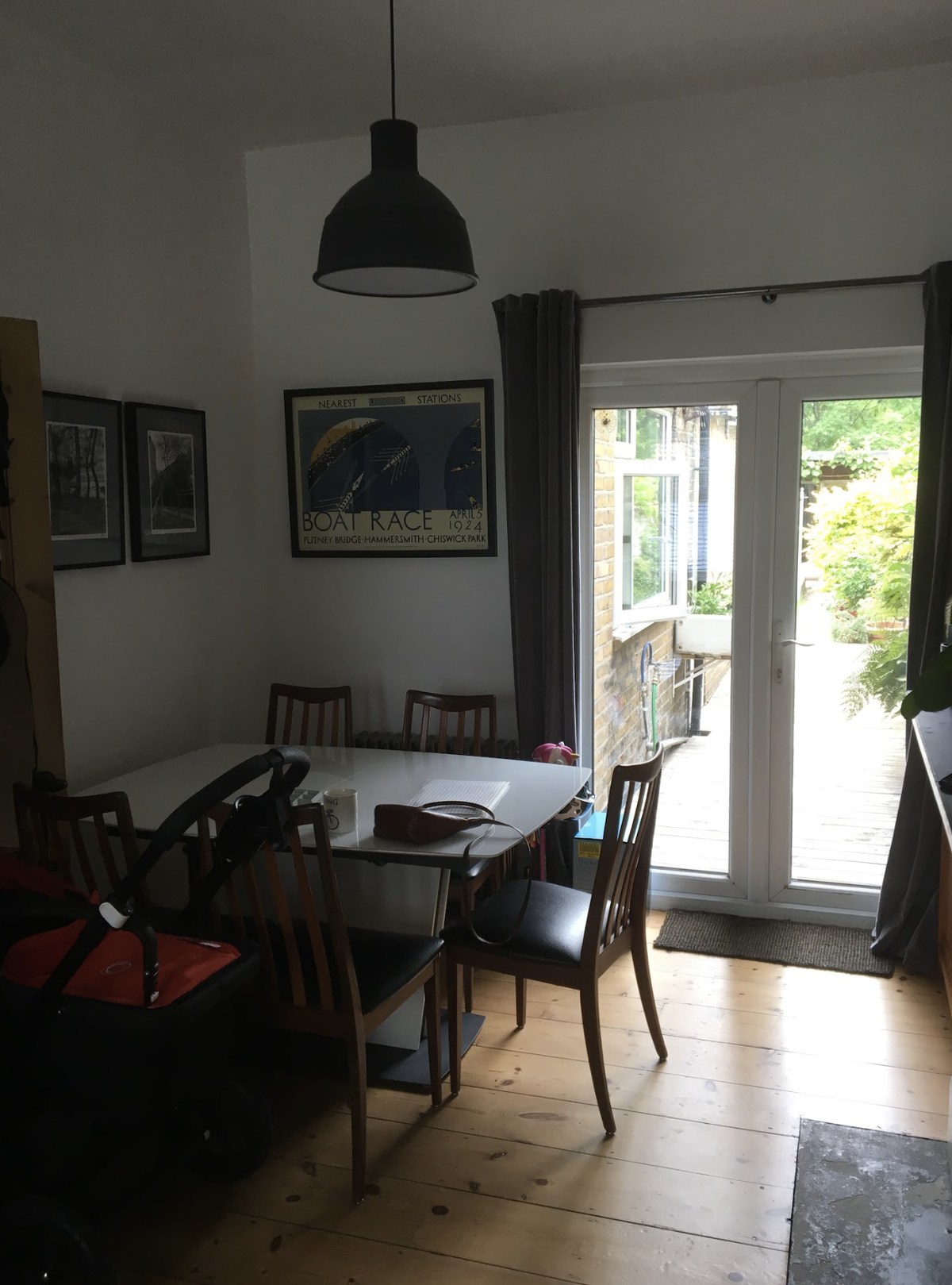 A before shot of a cramped and dark dining room