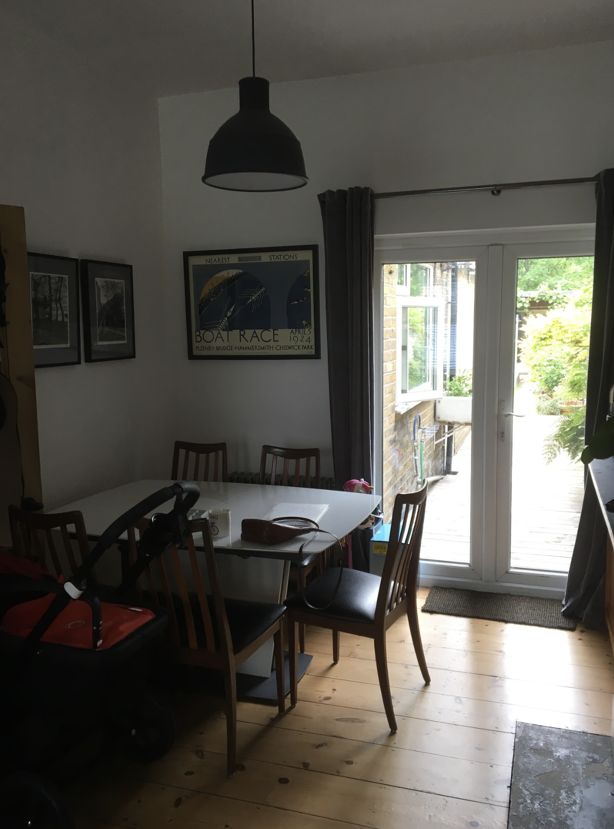 A before shot of a cramped and dark dining room