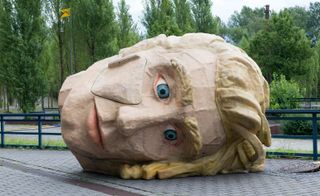 oversized heads that can be used as huts or shelters