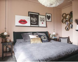 a small bedroom with pendant lights used as bedside lights in house.dowsing and reynolds house - KATIE LEE