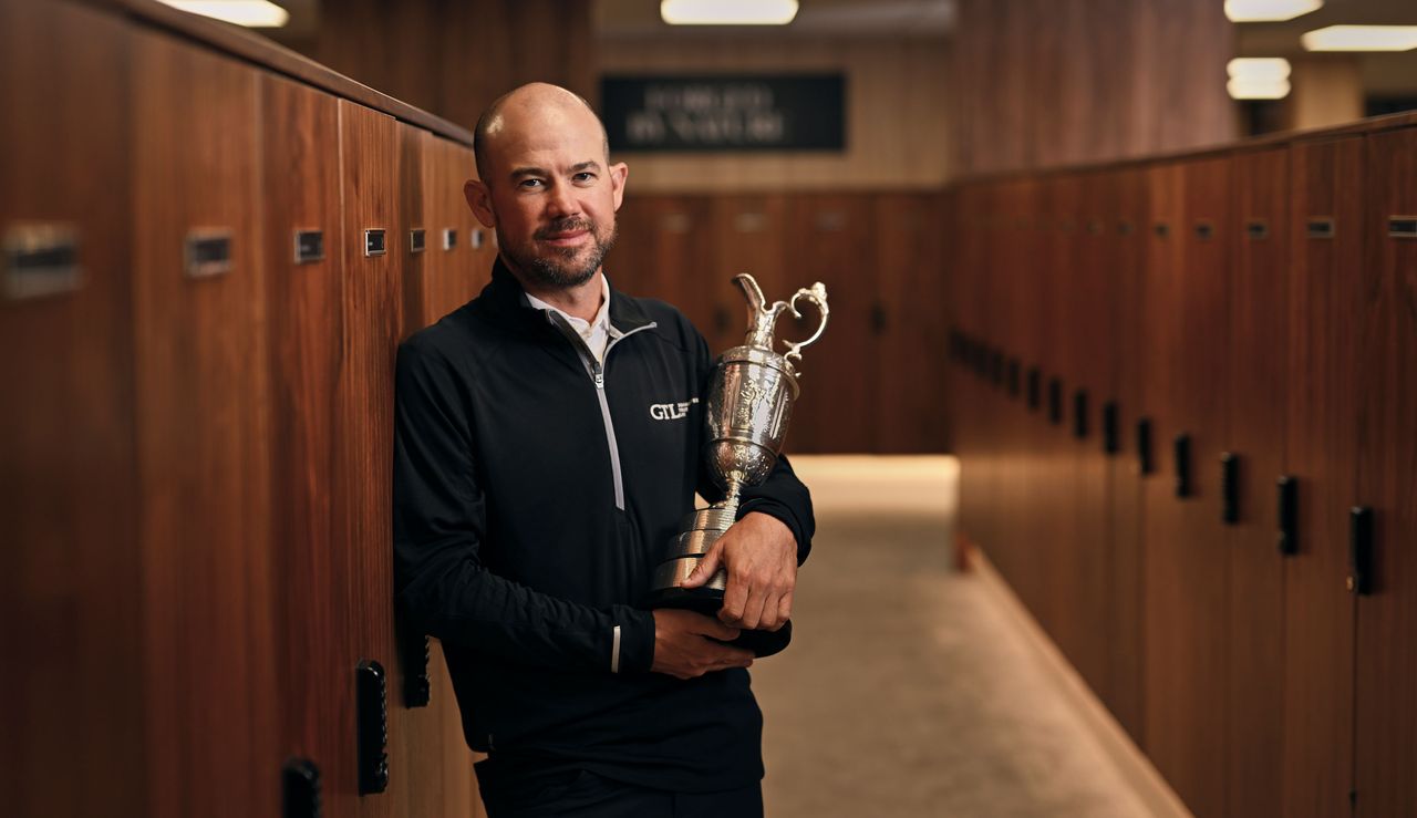 Harman holds the Claret Jug