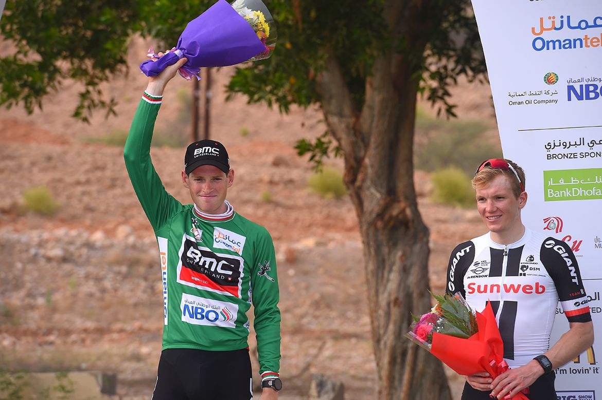 Ben Hermans in green as well as the red of race leader