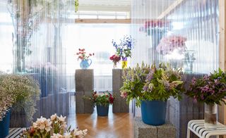 A room filled with floral displays.