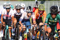 Britain's Elizabeth Deignan (C) competes during the women's cycling road race at the Fuji International Speedway in Oyama, Japan, at the Tokyo 2020 Olympic Games on July 25, 2021. (Photo by Michael Steele / POOL / AFP) (Photo by MICHAEL STEELE/POOL/AFP via Getty Images)