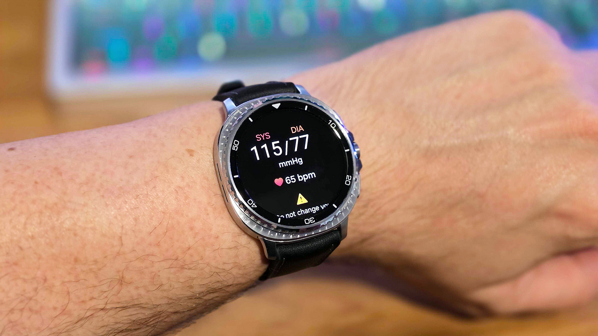 Samsung Galaxy Watch 8 Classic on wrist displaying blood pressure reading