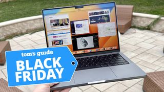 MacBook Pro 14-inch (2023) with a Tom's Guide Black Friday deal tag