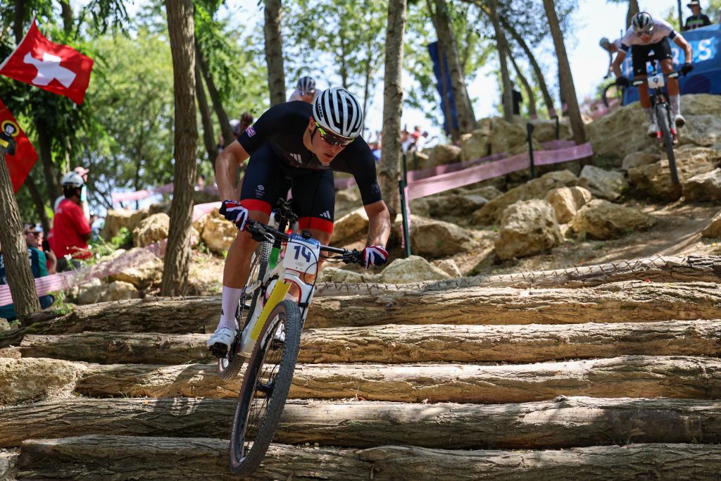 Britain's Charlie Aldridge competes in the men's cross-country mountain biking event during the Paris 2024 Olympic Games in Elancourt Hill venue in Elancourt, on July 29, 2024. (Photo by Emmanuel DUNAND / AFP)