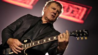 LONDON, UNITED KINGDOM - MAY 24: Alex Lifeson of Rush performs on stage at O2 Arena on May 24, 2013 in London, England. (Photo by Christie Goodwin/Redferns via Getty Images)