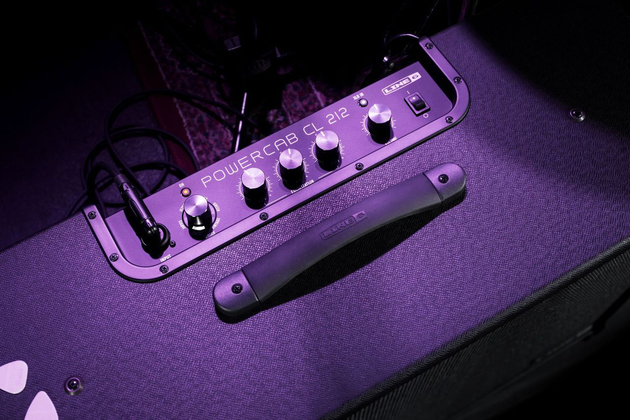 The Line 6 Powercab CL looks like the usual FRFR guitar speaker you might expect, but has switchable speaker voicings emulating classic drivers. It is pictured here onstage and in low-light situations.