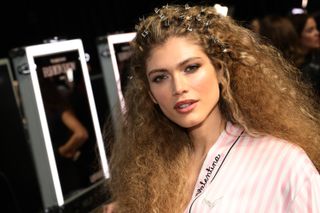 Valentina Sampaio gets ready backstage at the Victoria's Secret Fashion Show