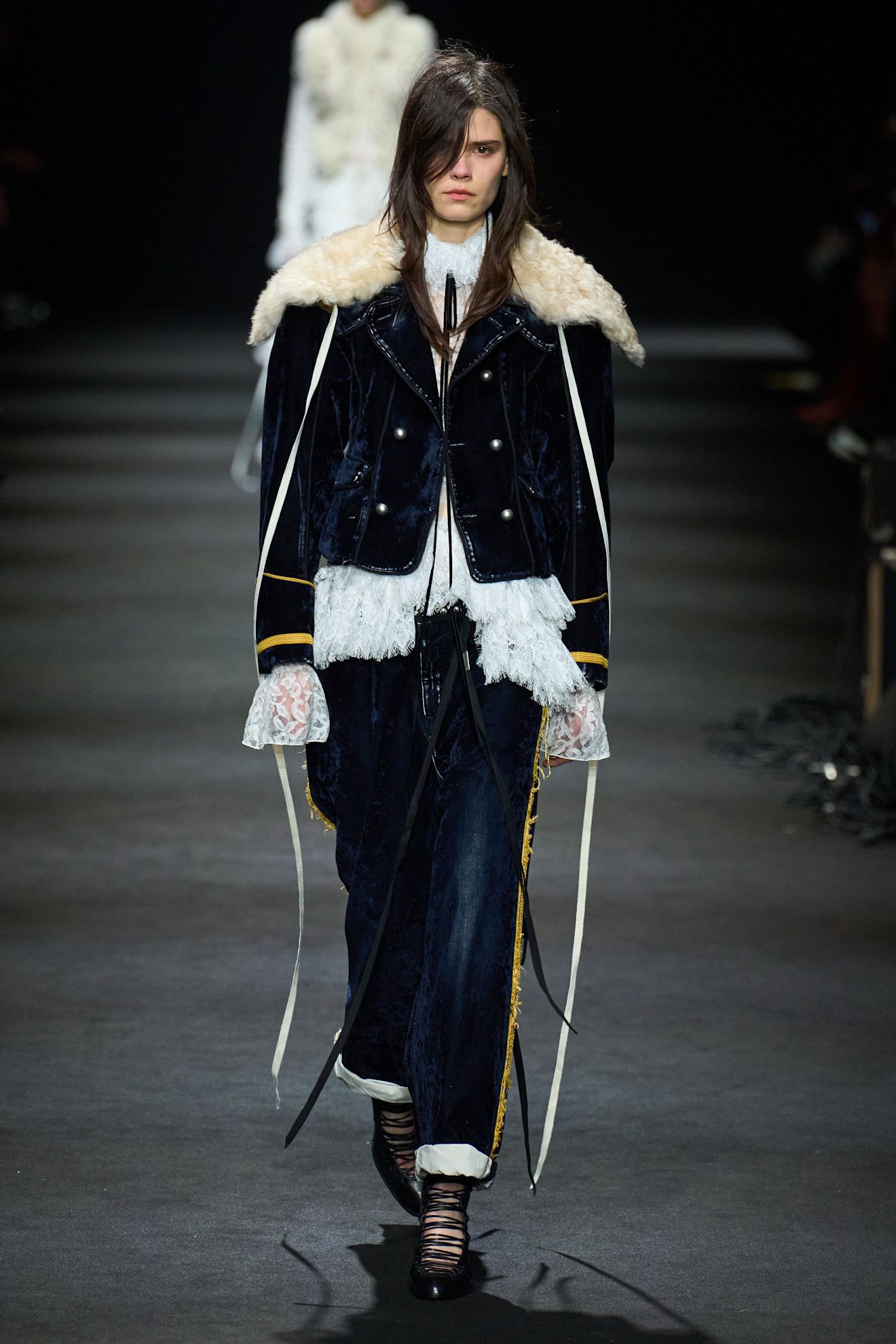 A model wore the military jacket trend on the Ann Demeulemeester Fall 2026 runway