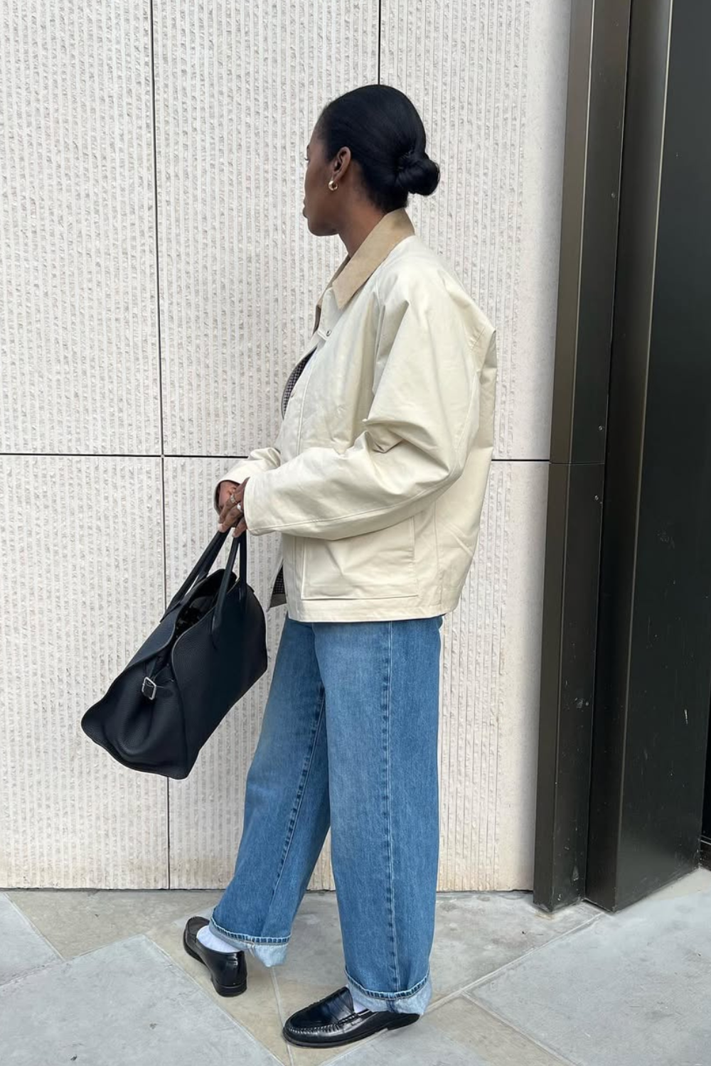@nlmarilyn wears cream barn jacket, jeans and loafers