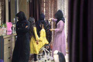 women in afghan salon ahead of taliban closing