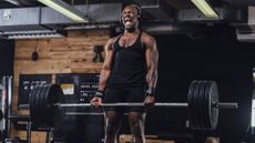 A man performing a really heavy deadlift