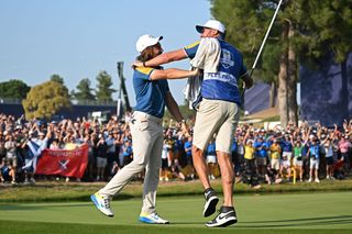 Tommy Fleetwood and Ian Finnis celebrate the winning moment at the 2023 Ryder Cup