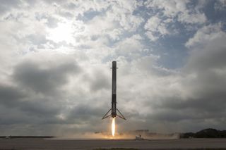 The first stage of a Falcon 9 rocket comes in for a landing on Feb. 19, 2017.