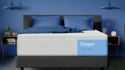 Casper Dream Max on a bed against a blue wall. 