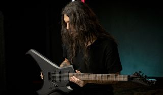 Rob Cavestany holds his newly-launched Jackson signature Pro Series guitar