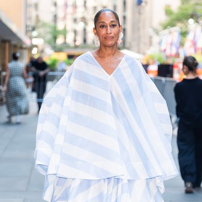 Tracee Ellis Ross wearing a slicked-back bun.