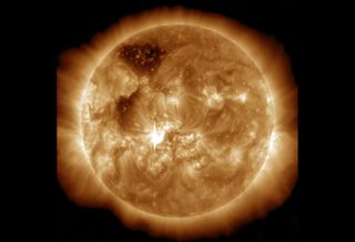 NASA's Solar Dynamics Observatory, which captures an image of the sun every 1.5 seconds, shows a mid-level M7.2-class solar flare at the center of the sun on Jan. 7, 2014.