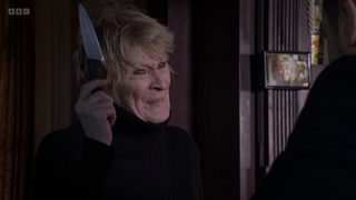 Shirley Carter with a knife