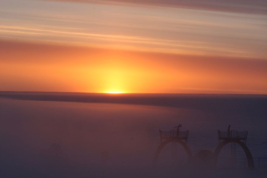 The sun setting over the Concordia research station in Antarctica. 