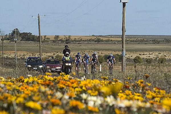 The leading quartet make their way towards Wentworth with a handy break on the peloton.