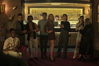 (L to R) Ozioma Whenu as Blessing, Ben Wiggins as Roald, Dario Coates as Connie, Lukas Gage as Adam, Tilly Keeper as Lady Phoebe, Charlotte Ritchie as Kate and Niccy Lin as Sophie Soo
