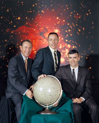 The crew of NASA's Apollo 13 lunar landing mission, poses for a group photo shortly before the mission launched in April 1970. From left to right: Apollo 13 Cmdr. Jim Lovell, command module pilot Jack Swigert, and lunar module pilot Fred Haise.