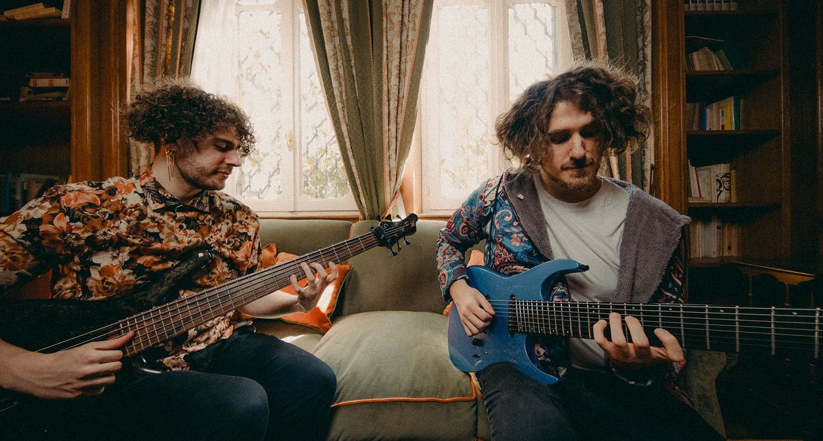 Asymmetric Universe&#039;s Nicolo and Frederico Vese (right, guitar) jam in their front room