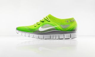 Bright green Nike running shoes.