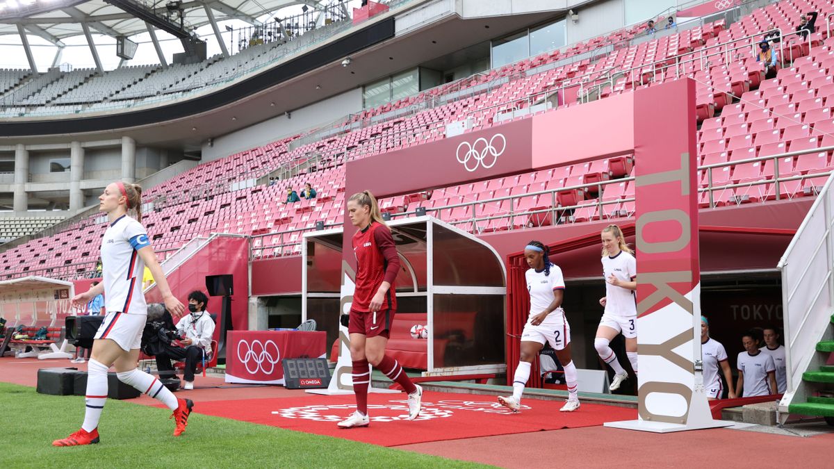 Becky Sauerbrunn #4 (L) of Team United States leads the team on to the pitch prior to the Women&#039;s Football Group G match between United States and Australia on day four of the Tokyo 2020 Olympic Games at Kashima Stadium on July 27, 2021 in Kashima, Ibaraki, Japan. 