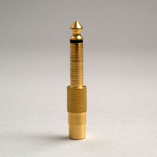 A gold headphone jack from 'A Comprehensive Atlas of Gold Fictions' by Aram Mooradian, 2011