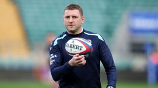 Finn Russell of Scotland spins a rugby ball in his hand in preparation for the upcoming international fixture against New Zealand