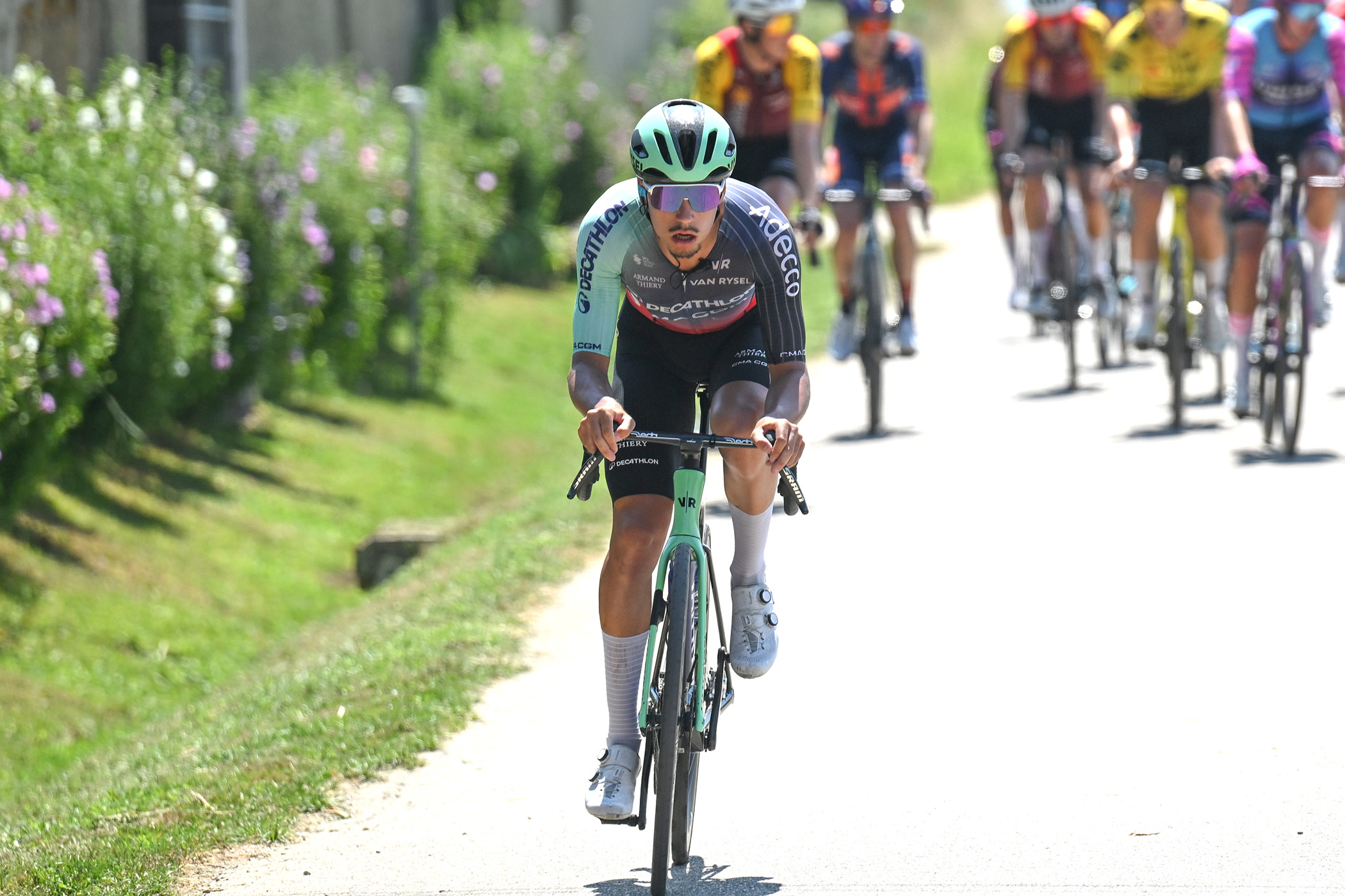 Noa Isidore, pictured here on the attack at the 2026 Tour de l'Ain, scored his first pro win at the Tour du Limousin