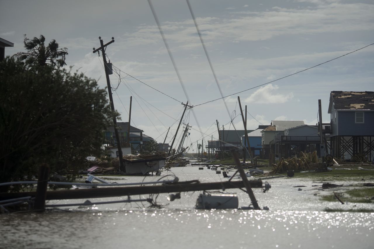 damaged homes in aftermath of Hurricane Laura