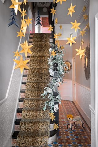 Christmas hallway with hanging gold stars