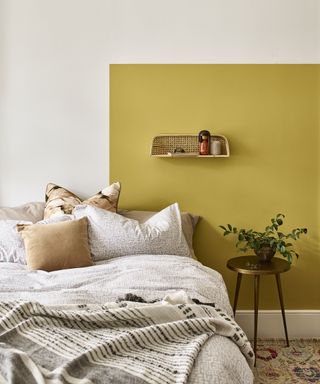 A DIY headboard using Dulux simply refresh paint in color golden sands