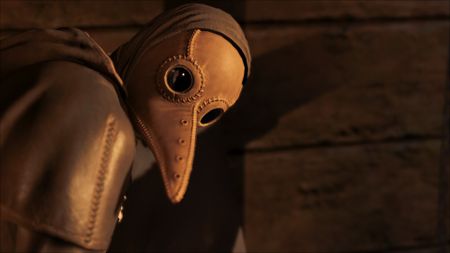 A figure in a beaked mask