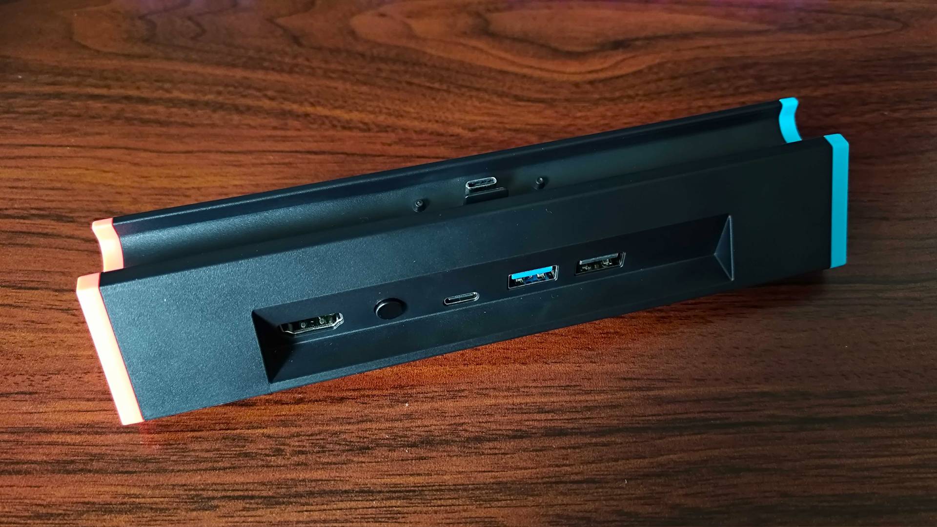 SIWIQU Nintendo Switch 2 dock with view of back ports sitting on woodgrain desk.