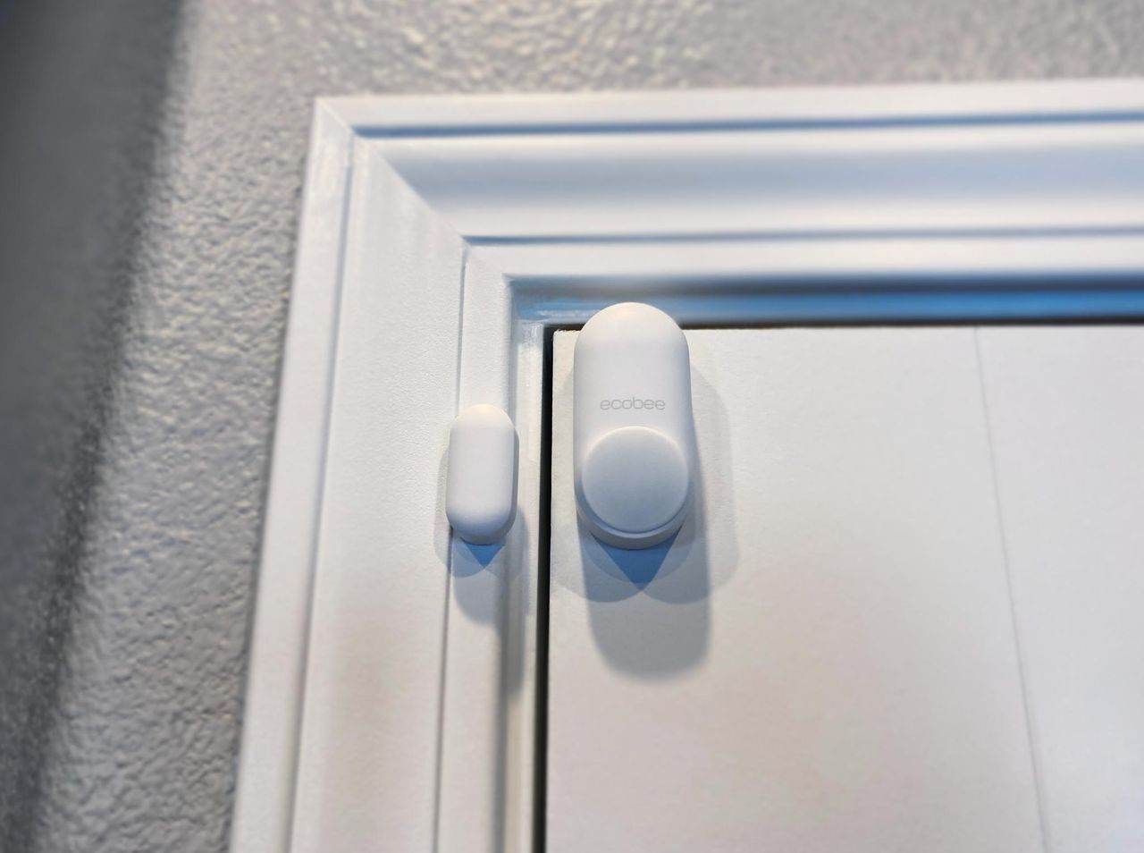 ecobee SmartSensor installed on an interior door